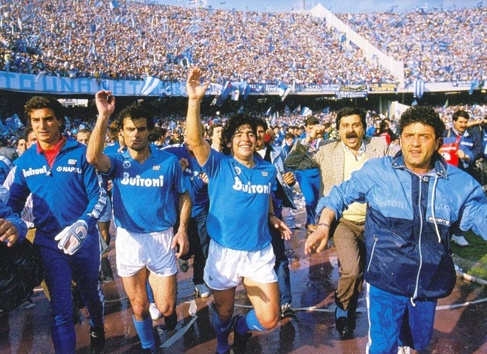 Diego Maradona celebrates Napoli's first Scudetto in a classic kit.