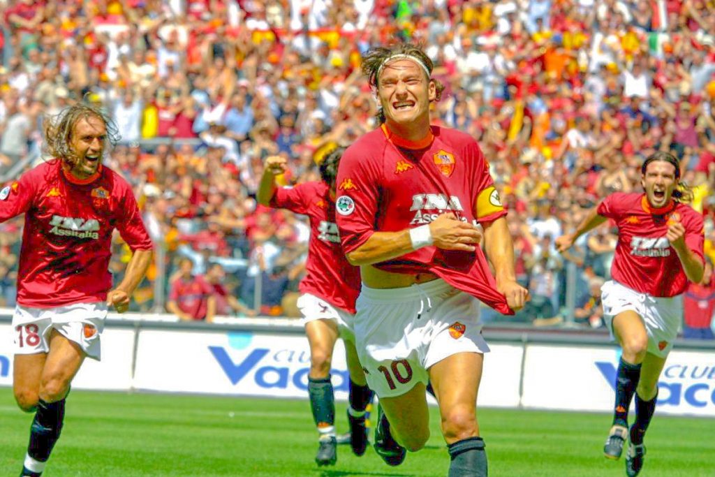 Francesco Totti wins the Scudetto for Roma and celebrates in an all time great kit